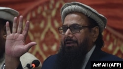 حافظ سعید د جماعت الدعوه ډلې مشر دی او دا ډله د پاکستان د حکومت لخوا تر بندیز لاندې ده: انځور له ارشیفه