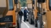 KOSOVO -- Local Serbs stand beside a road blocking the road leading to the northern Kosovo border crossing of Jarinje, September 21, 2021
