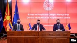 Премиерот Зоран Заев и министрите за надворешни работи и за европски прашања Бујар Османи и Никола Димитров.