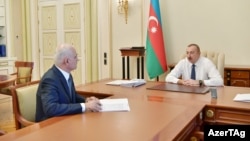 Ադրբեջանի փոխվարչապետ Շահին Մուստաֆաևը և Իլհամ Ալիևը, արխիվ