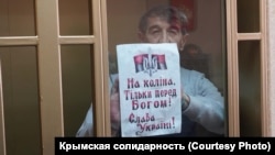 Кримчанин Олег Приходько, незаконно ув'язнений Росією. Фото із судового засідання. 