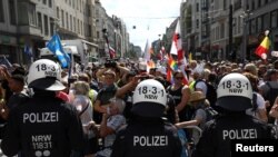Berlin, demonstrație împotriva restricțiilor sanitare impuse de pandemia de coronavirus. 29 august 2020
