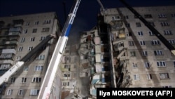 PHOTO GALLERY: Suspected Gas Explosion Devastates High-Rise In Russia's Magnitogorsk (CLICK TO VIEW)
